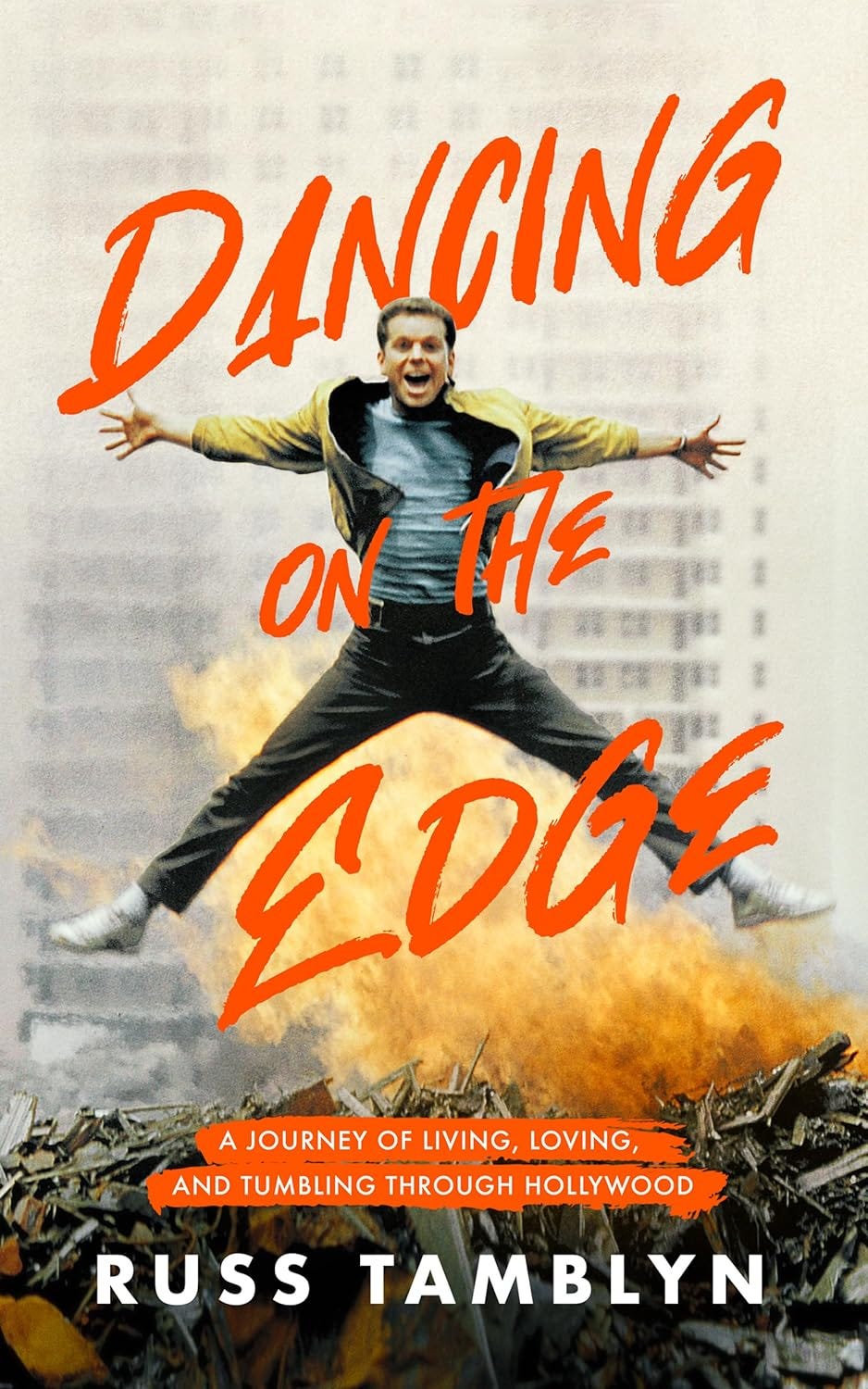 The book cover for "Dancing on the Edge: A Journey of Living, Loving, and Tumbling through Hollywood" by Russ Tamblyn.