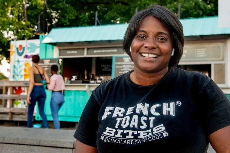 Charisse McGill poses outside her Lokal Artisan Foods in Spruce Street Harbor Park July 29, 2020. McGill died unexpectedly on Monday, Jan. 15.