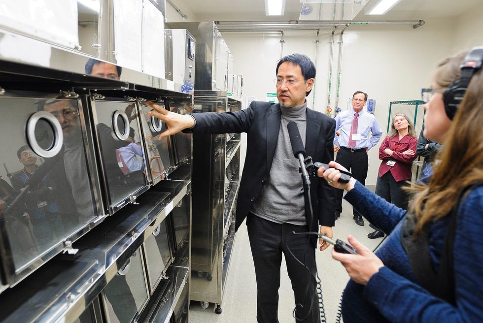 Virologist Yoshihiro Kawaoka gives a tour of the Influenza Research Institute at the University of Wisconsin-Madison in 2013.