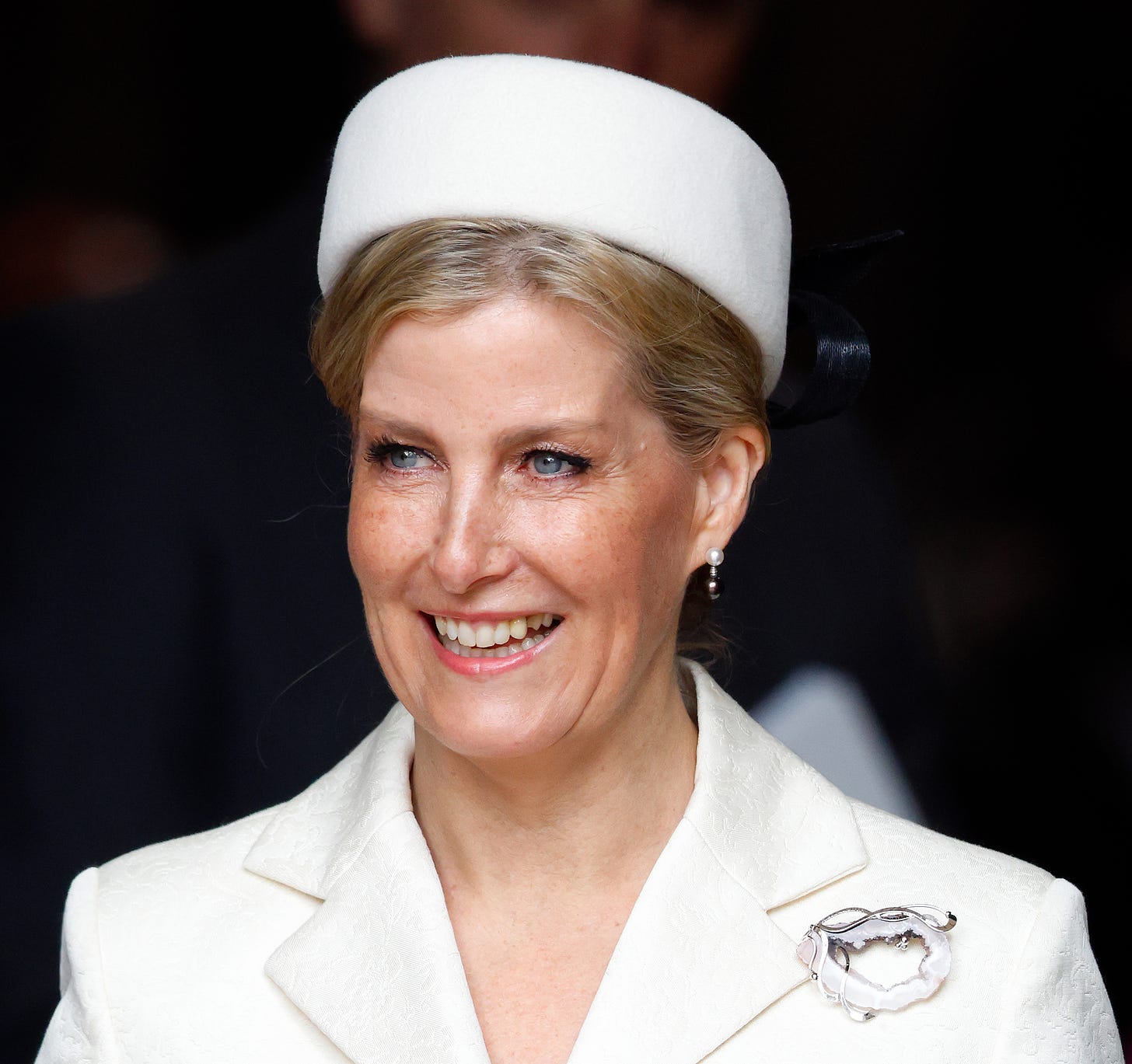 sophie duchess of edinburgh wearing white outfit and hat