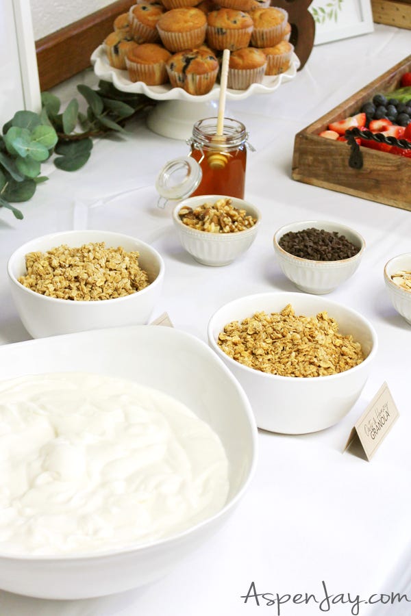 Need a fabulous brunch party idea? Set up a Yogurt Parfait Bar! Your guests will love creating their own parfaits and you'll appreciate how easy the whole spread was to throw together!