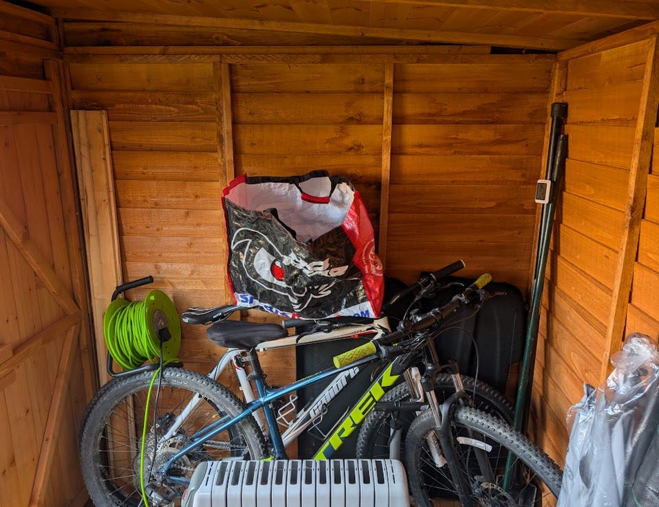 Image showing the current clutter causing issues inside the shed.