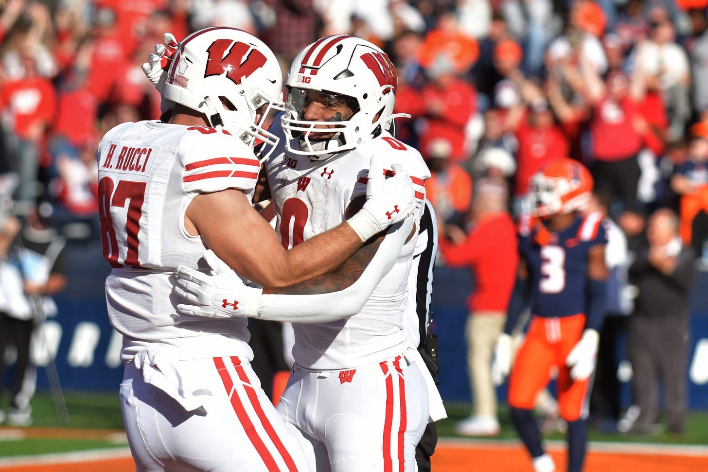 Wisconsin Football; Badgers running back Braelon Allen celebrates a touchdown with tight end Hayden Rucci.