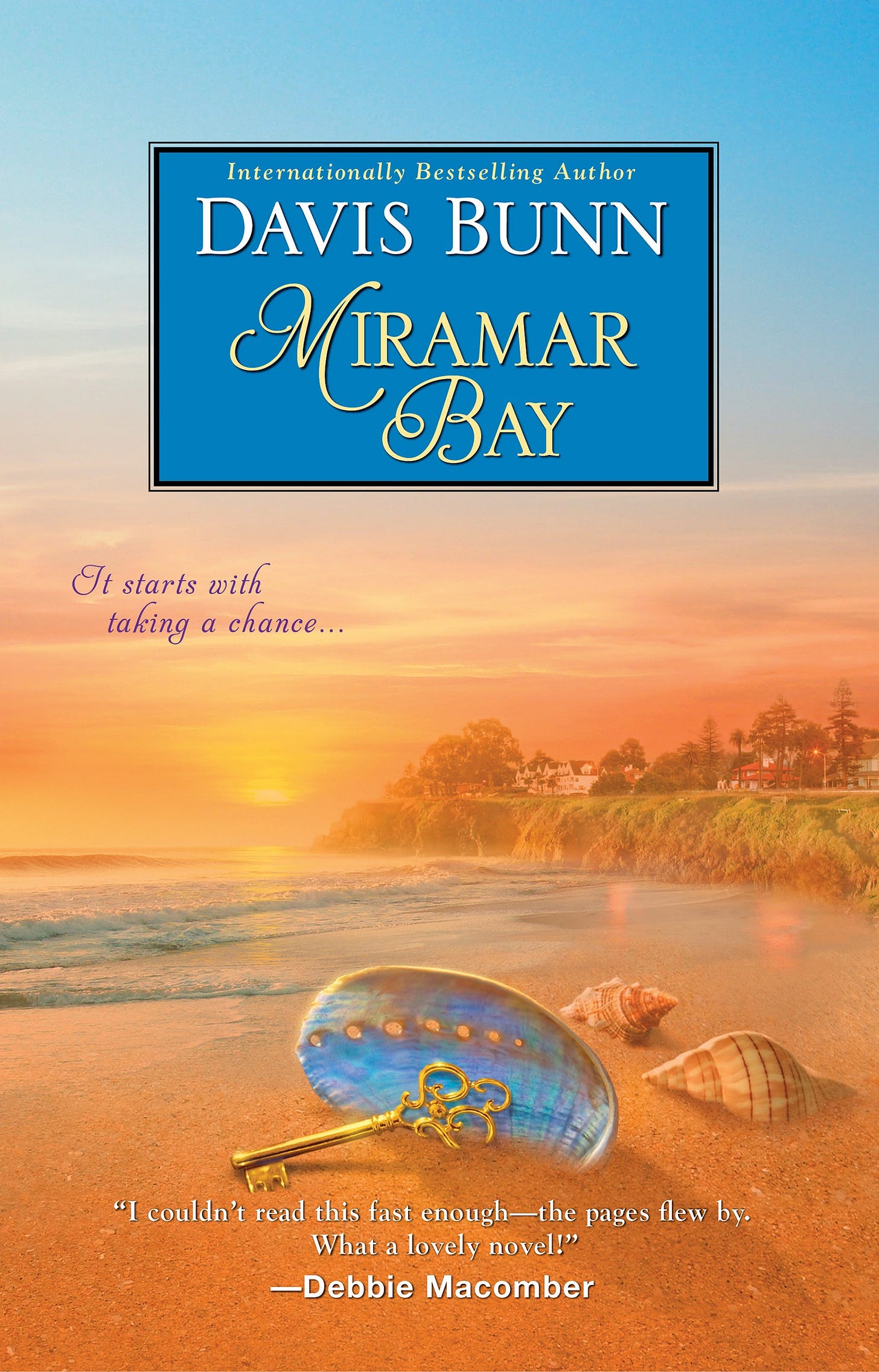 Book cover shows the seaside at sunset, with a seashell beside a golden key on the shore