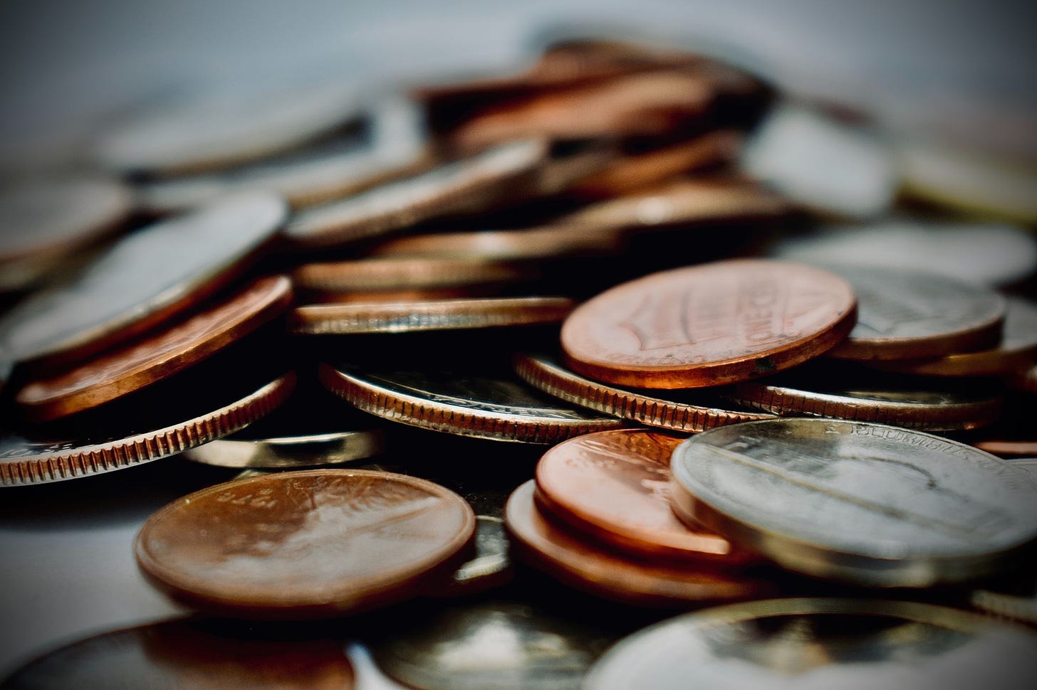 photo of coins by Amelia Spink via Unsplash