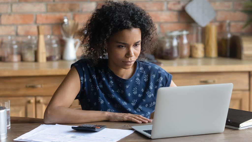 Woman doing personal finances at home