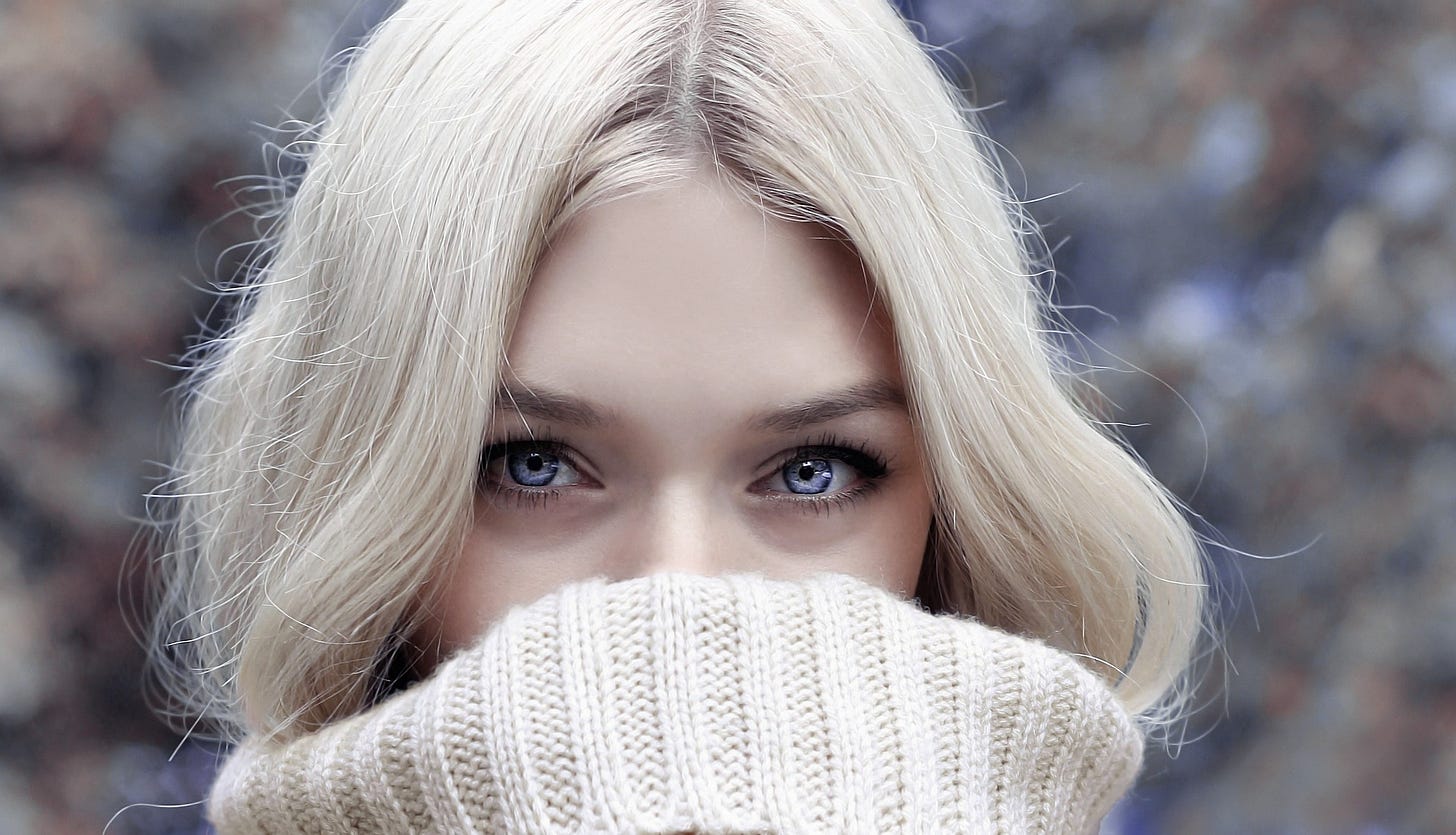 Woman in white sweater