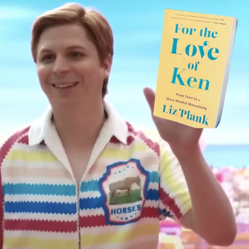ken holding up a book called for the love of ken