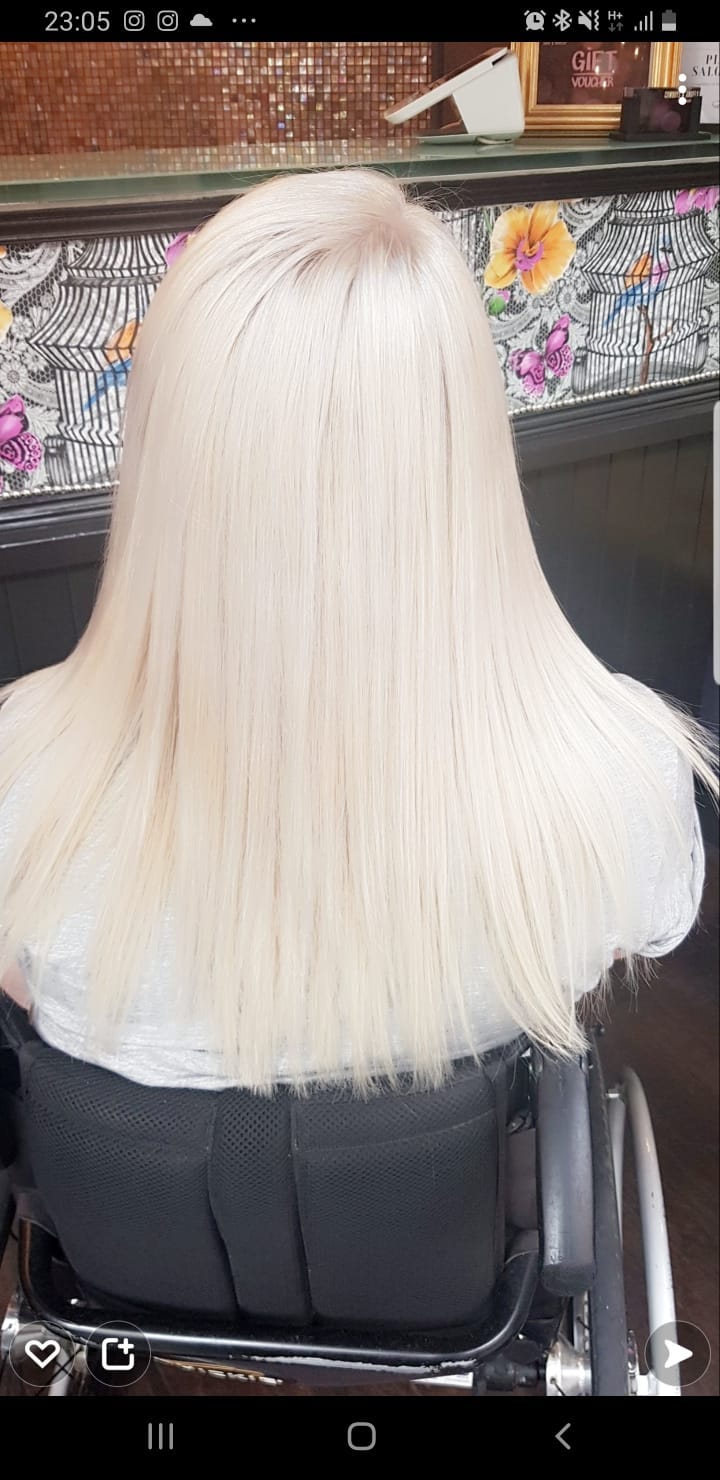 A photo of the back of my hair with ice-white bleached hair. 