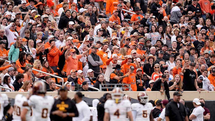 The Oklahoma State fans react after an Arizona State player is ejected in the first half of the college football game between the Oklahoma State Cowboys and the Arizona State Sun Devils at Boone Pickens Stadium in Stillwater, OK. on Saturday, Nov. 2, 2024.