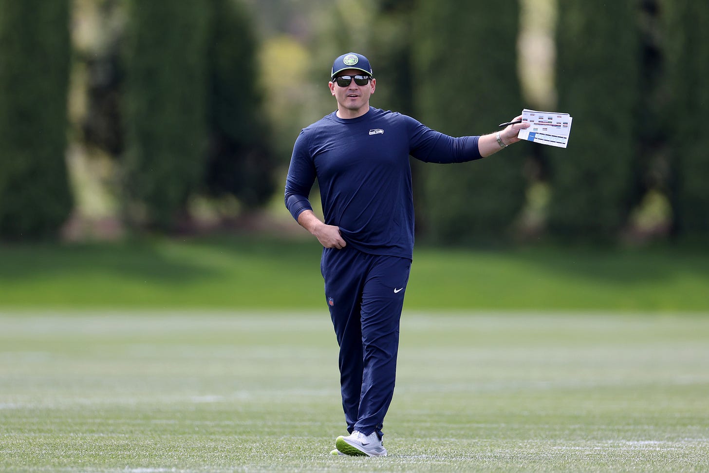 RENTON, WASHINGTON - MAY 03: Head coach Mike Macdonald of the Seattle Seahawks watches a workout during Seattle Seahawks rookie minicamp at Virginia Mason Athletic Center on May 03, 2024 in Renton, Washington. (Photo by Steph Chambers/Getty Images)
