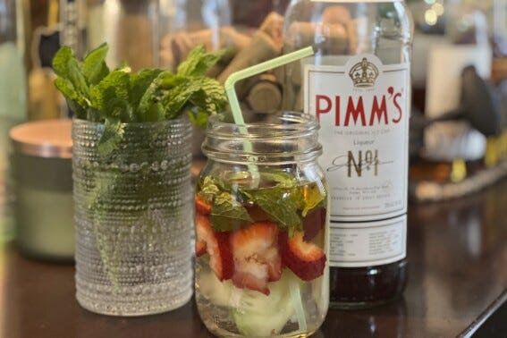 This April 10, 2025, image provided by Jessica Damiano shows a Pimm's Cup cocktail made with fresh mint, strawberries and cucumber on Long Island, N.Y. (Jessica Damiano via AP)