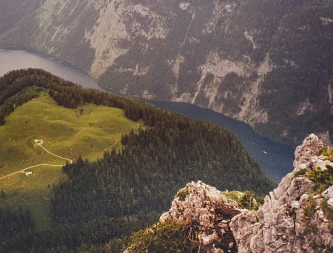 Mountain meadow with river in background