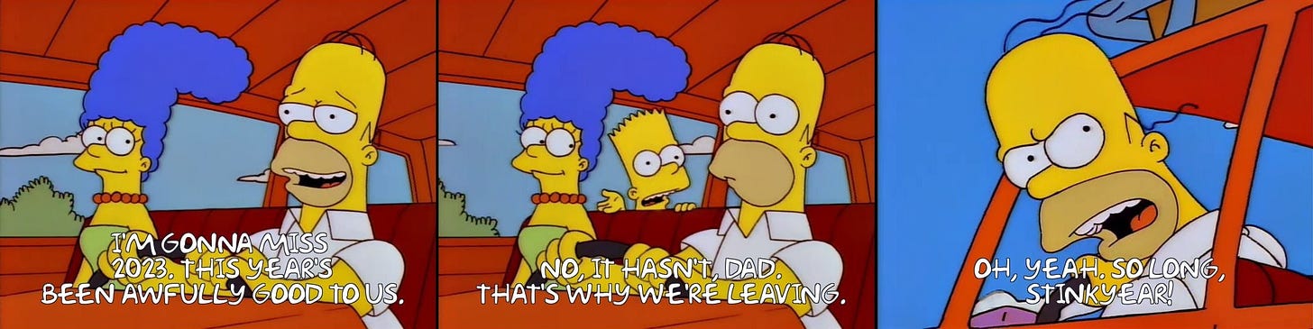 Homer Simpson driving, Marge Simpsons in the passenger seat, and Bart Simpson (all three with yellow skin and large ball-like eyes) in the backseat