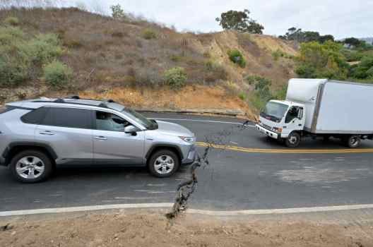 Drivers navigate the rough roads in Rancho Palos Verdes on Tuesday, June 18, 2024.  (Photo by Brittany M. Solo, Press-Telegram/SCNG)
