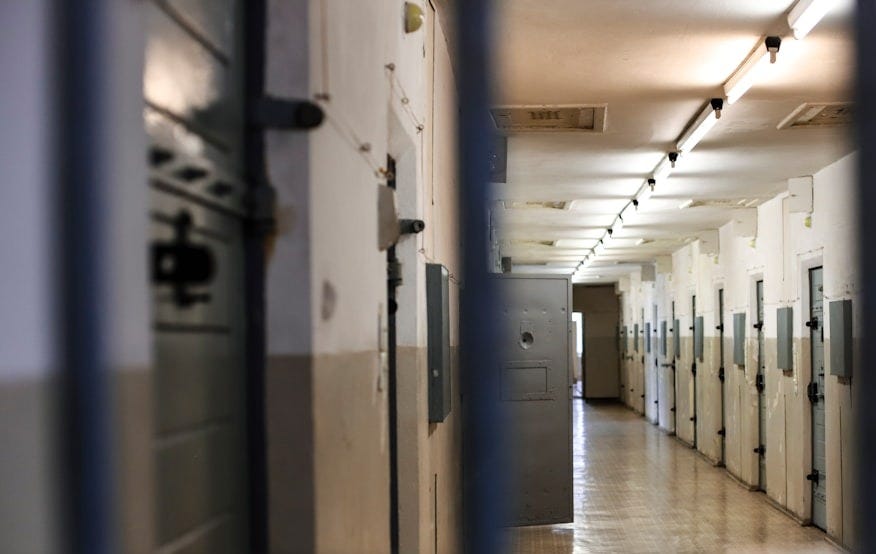 a long hallway with a bunch of lockers in it