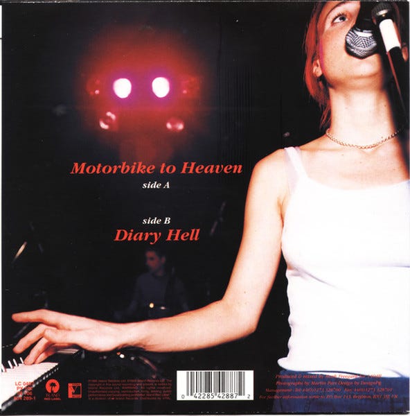 Picture sleeve for Salad's single "Motorbike to heaven" with a photo of Marijne singing and playing keyboards as described in my review.