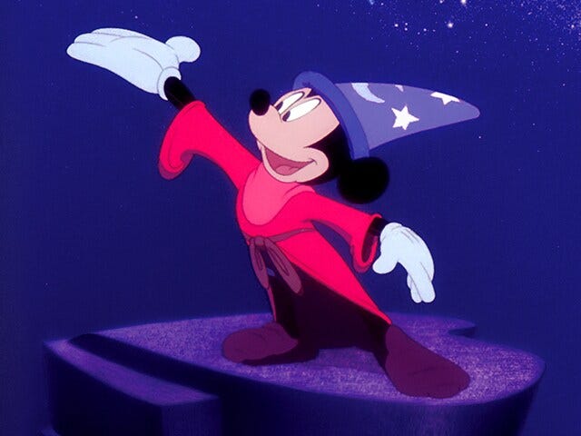 Mickey Mouse with his magic hat in Fantasia