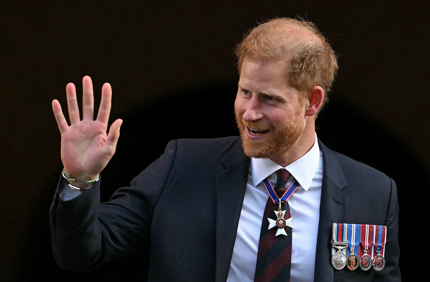prince harry arriving at invictus games anniversary service