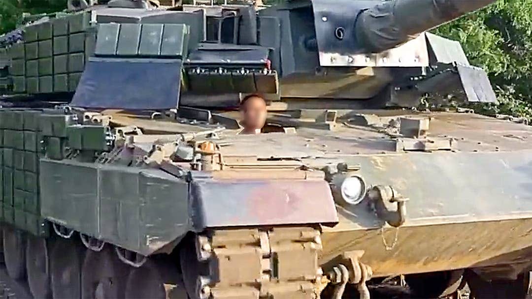 Ukrainian Leopard 2 Tank Seen Covered In Explosive Reactive Armor