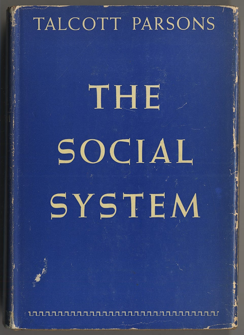 Book cover, The Social System by Talcott Parsons, blue background with white text
