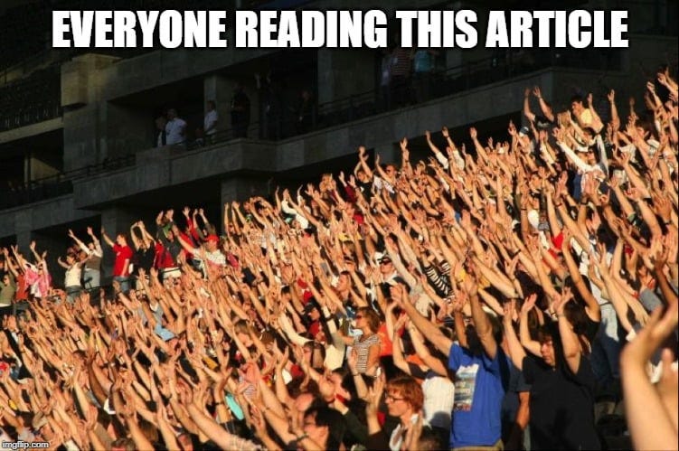 A sea of raised hands captioned "Everyone reading this article"