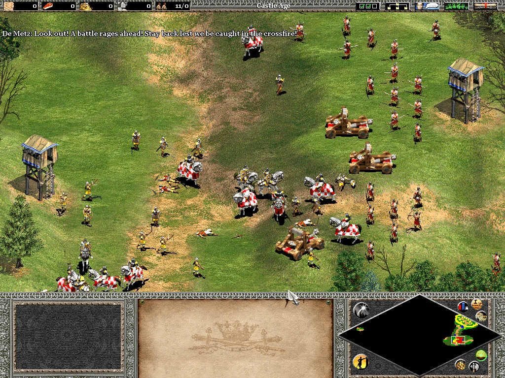 Screenshot from classic RTS Age of Empires 2 featuring a heated battle between medieval armies on an open field