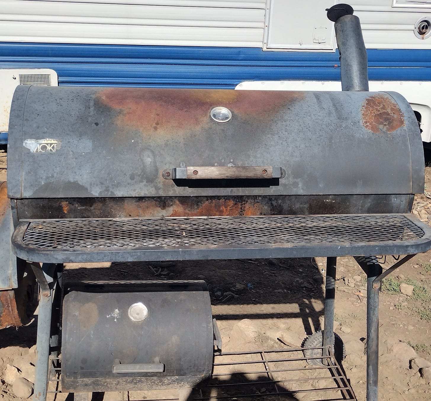 Picture of the much-decaying barbecue smoker.