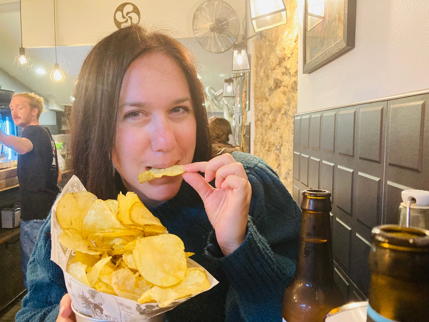 Eating homemade warm crisps at Cab in Biarritz