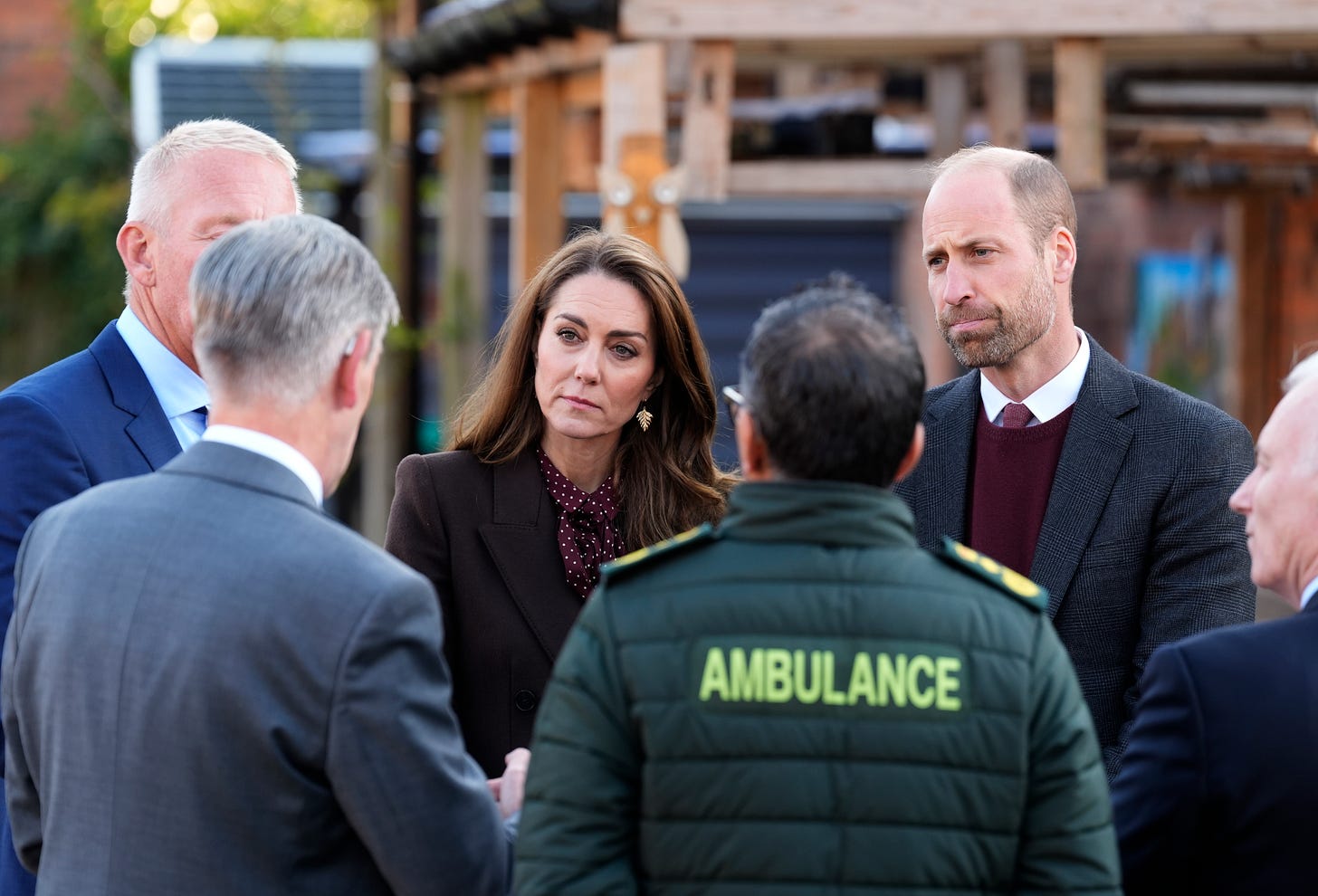 William and Catherine speaking with ambulance staff in Southport