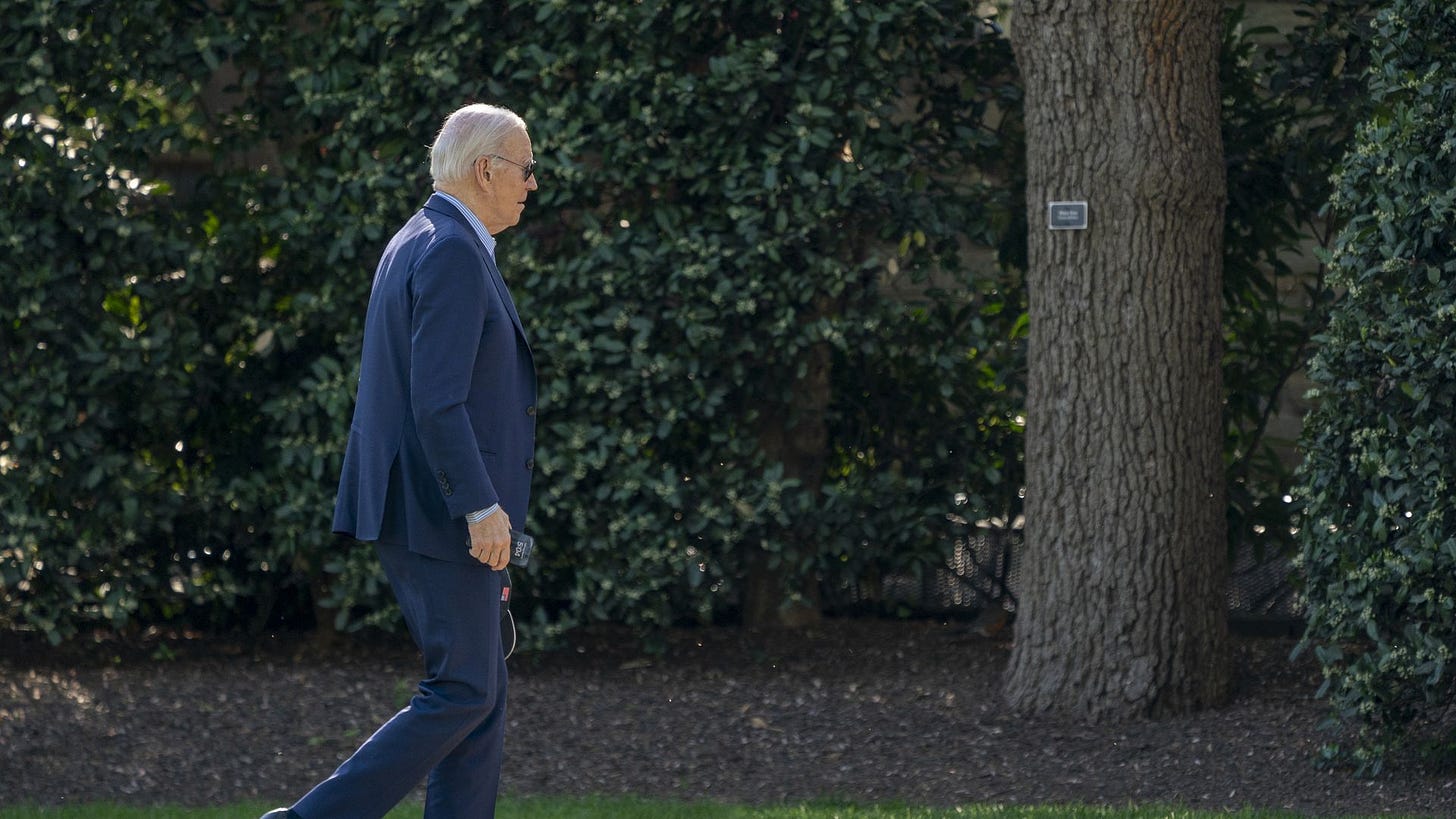 US President Joe Biden walks on the South Lawn of the White House after arriving in Washington, DC, US, on Saturday, April 13, 2024.