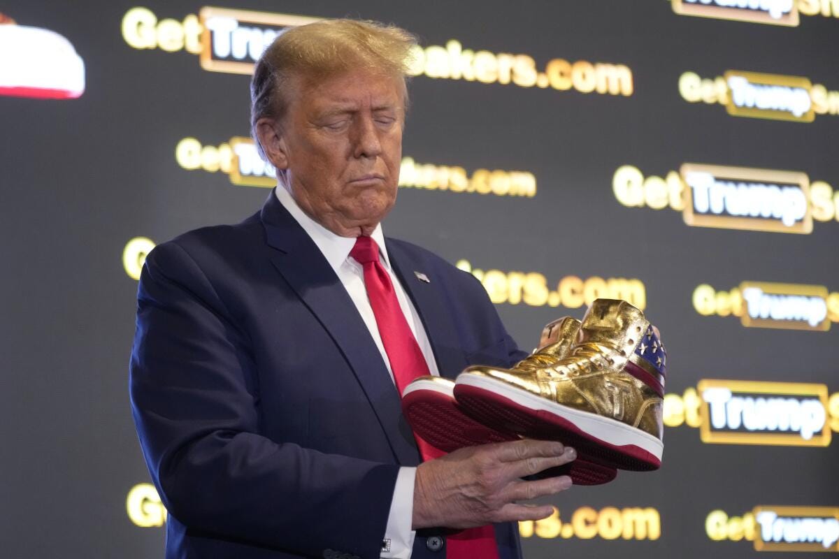 Trump hawks $399 branded shoes at 'Sneaker Con,' a day after a $355-million  ruling against him - Los Angeles Times