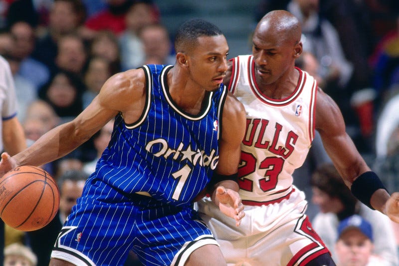 CHICAGO, IL - DECEMBER 13: Anfernee Hardaway #1 of the Orlando Magic handles the ball against Michael Jordan #23 of the Chicago Bulls on December 13, 1995 at the United Center in Chicago, Illiniois. NOTE TO USER: User expressly acknowledges and agrees that, by downloading and/or using this photograph, user is consenting to the terms and conditions of the Getty Images License Agreement. Mandatory Copyright Notice: Copyright 1995 NBAE (Photo by Scott Cunningham/NBAE via Getty Images)