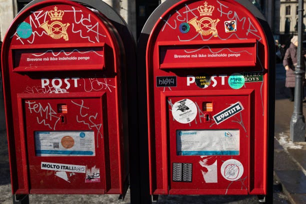 Two Danish red letter box, letterbox, letter plate, letter hole, mail slot or mailbox in front of The Marble Church.