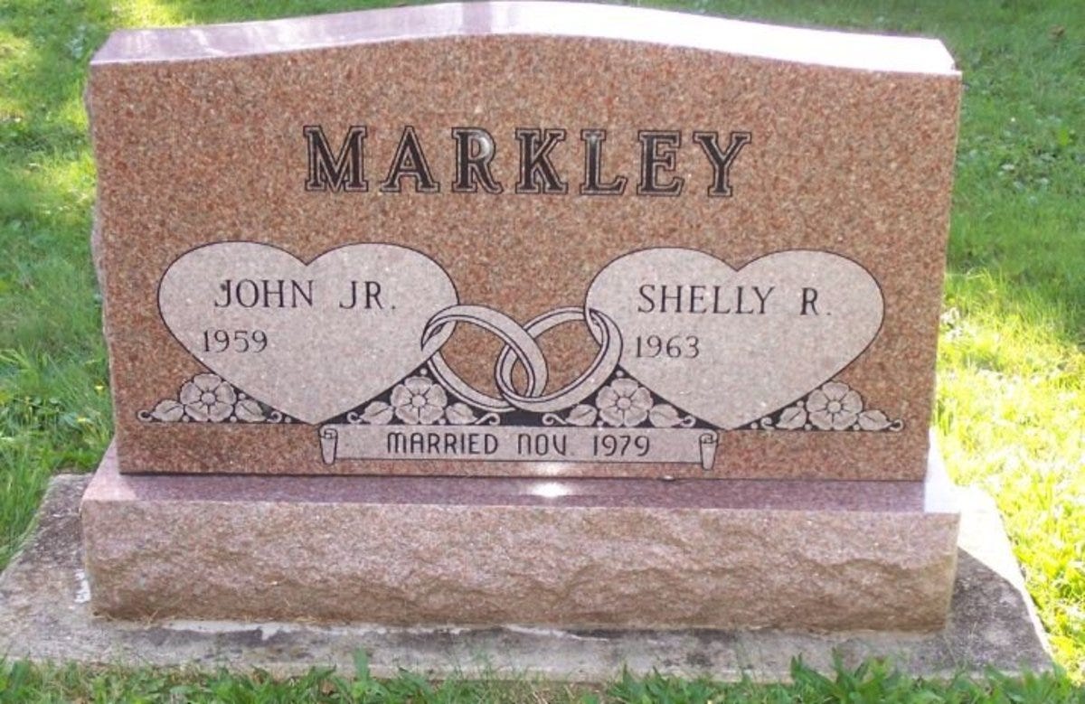 The gravestone for John and Shelly Markley