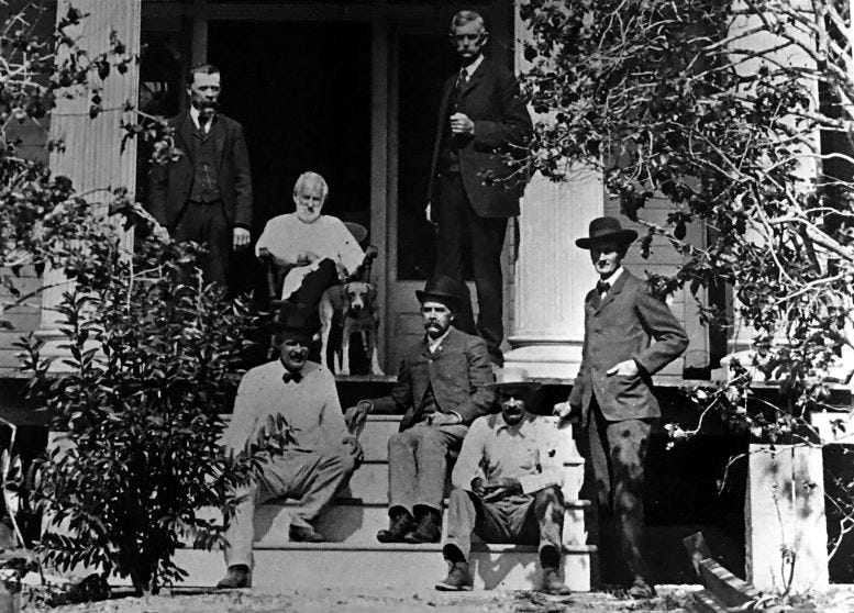 Brickell family in the early 1900s. William Brickell is seated on the porch surrounded by his sons and guests. Courtesy of Florida State Archives.