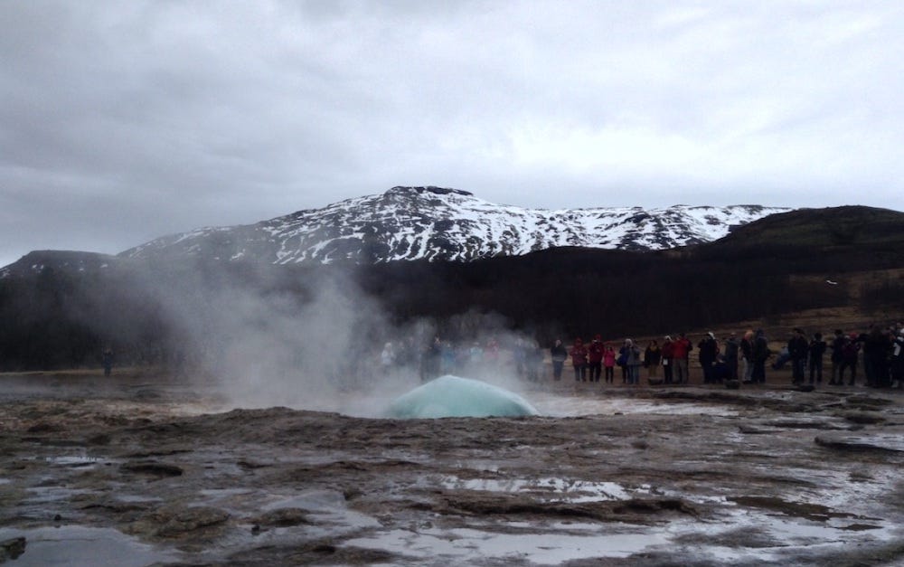 A bubble forms on the surface as the geyser is about to pop