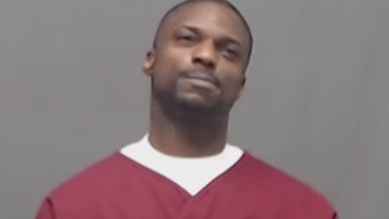 Oklahoma inmate Michael Smith in prison uniform.