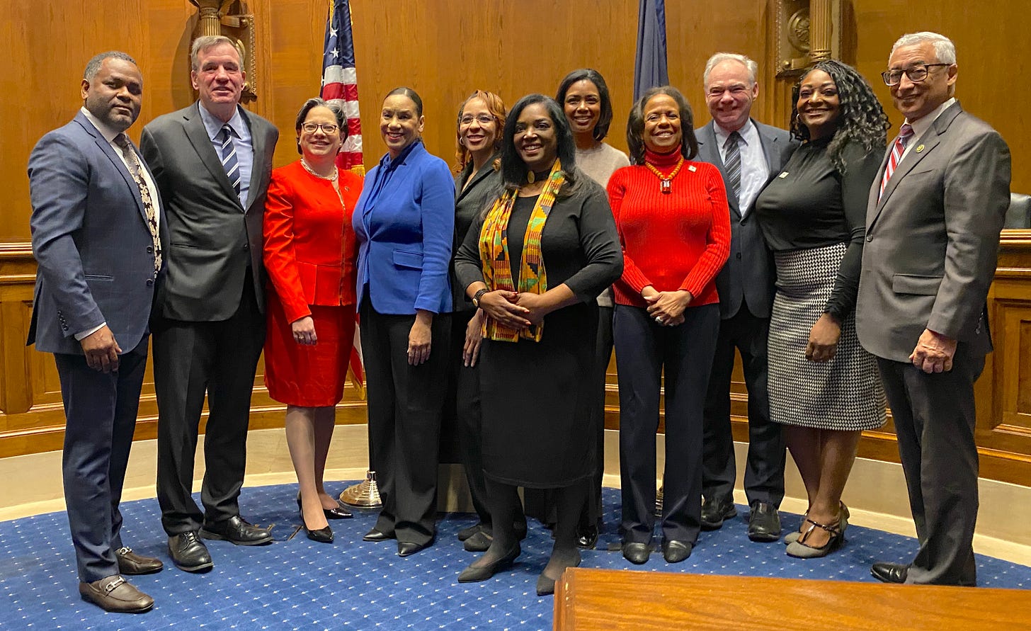 Group takes a photo with Sen. mark Warner, Rep. Jennifer McClellan and Congressman Bobby Scott