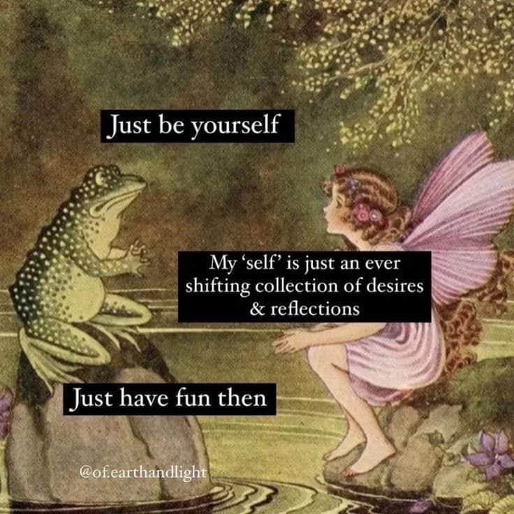 This may contain: a fairy sitting on top of a rock next to a frog
