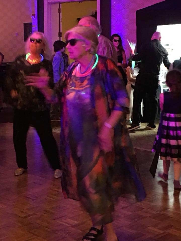 Katharine grooving with family & friends out on the dance floor.