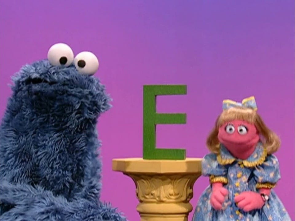 Cookie Monster, Prairie Dawn, and the letter E