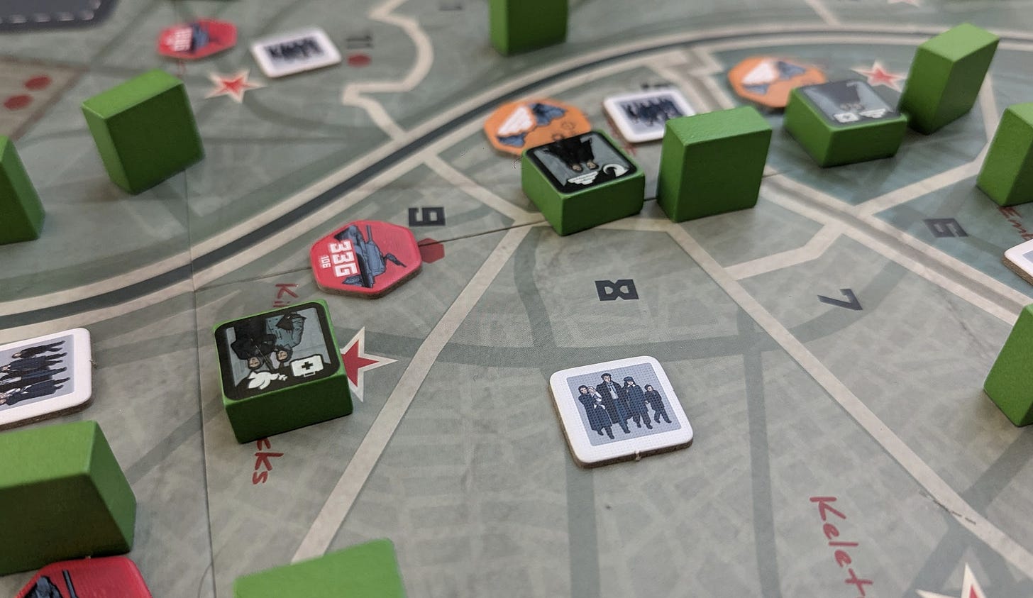 Board of the game Nights of Fire depicting map of Budapest, with game pieces for tanks, protesters and civilians are placed on the board