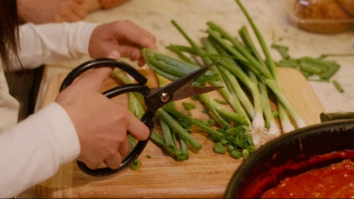 Cutting scallions with scissors in "Always Be My Maybe" | Image credit: Netflix