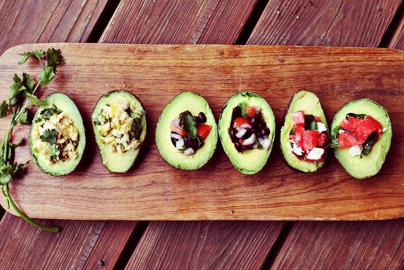 avocado salads on wooden server health fitness