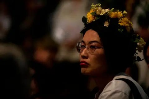 NurPhoto Protesters, about 150, gather at the rally called 'Flower Demo' to criticize recent acquittals in court cases of alleged rape in Japan and call for revision of the anti-sex crime law, in front of Tokyo Station in Tokyo, Japan June 11, 2019.