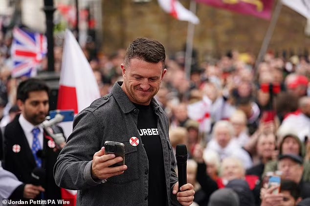 Robinson, real name Stephen Yaxley Lennon, attending a St George's Day rally on Whitehall, in Westminster, in April