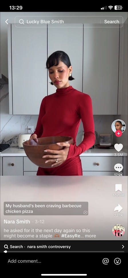 Screenshot from TikTok, where Nara Smith (a gorgeous woman with short dark hair wearing a red dress) is making a pizza from scratch