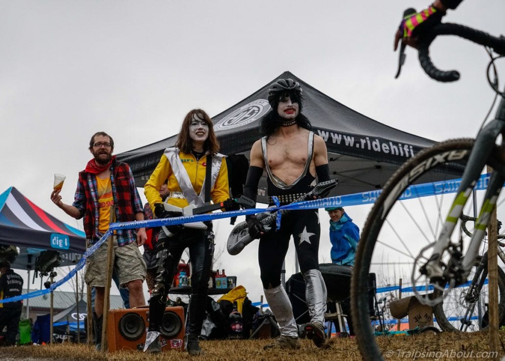 Kiss rocks out with some air guitar. (They both raced later.)