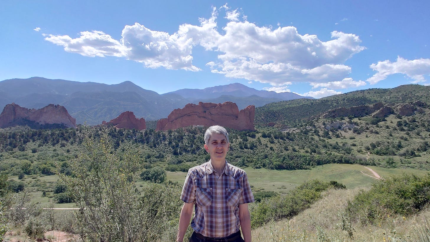 Pike's Peak and Garden of the Gods behind Bonnie Huval in September 2024